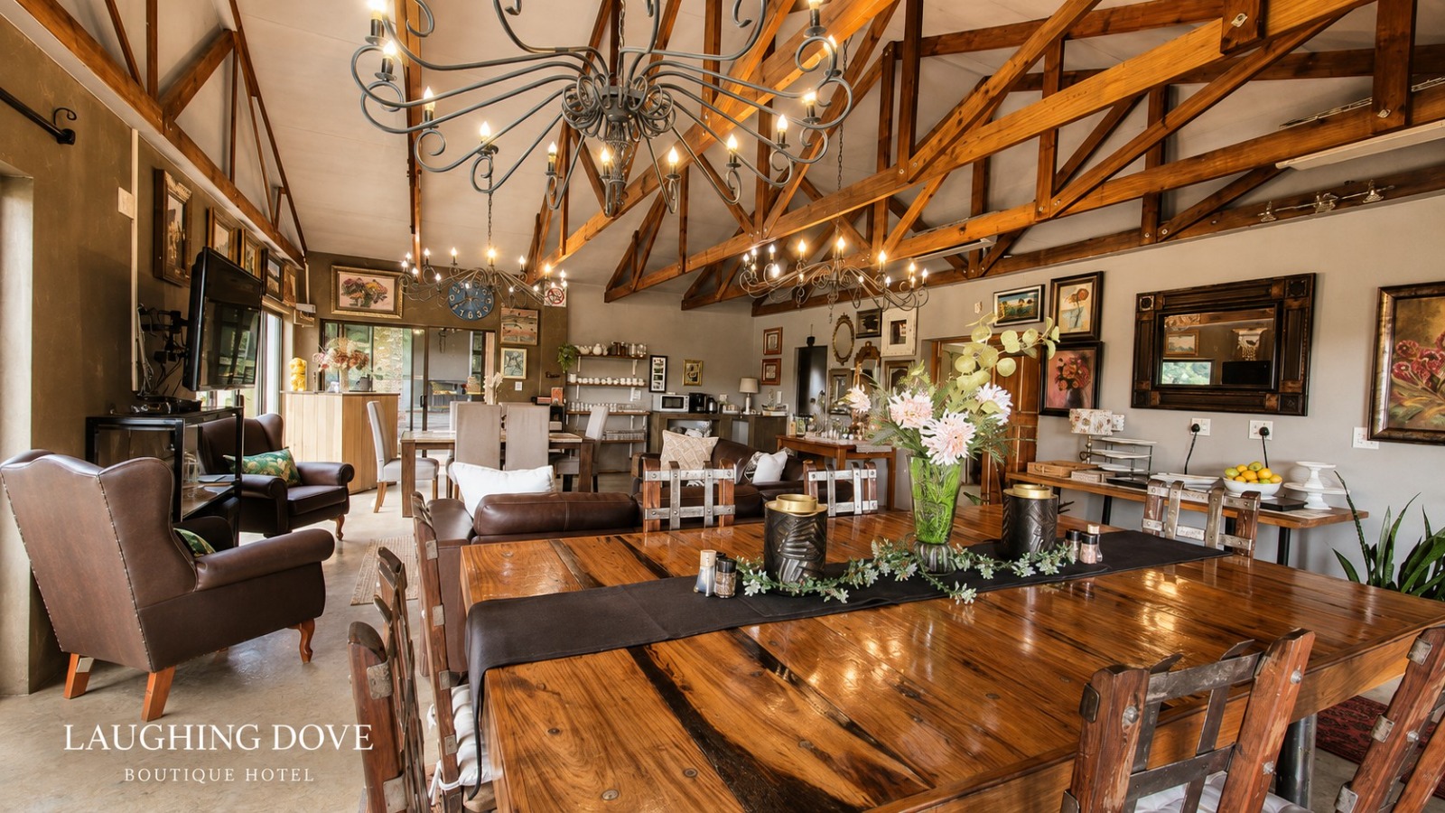 The warm and spacious dining room at Laughing Dove Boutique Hotel