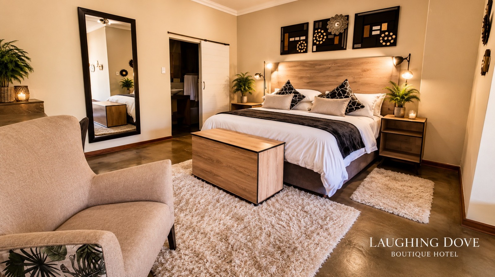 An individually styled double room at Laughing Dove Boutique Hotel