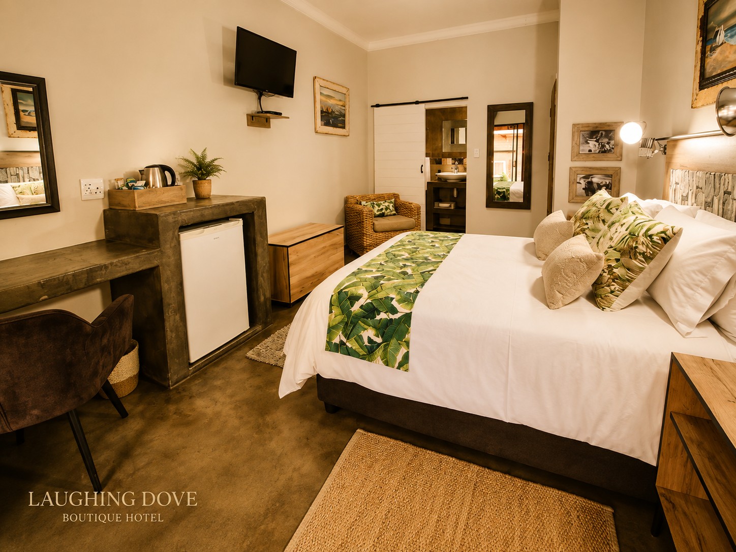Comfortable work-friendly guest room at Laughing Dove